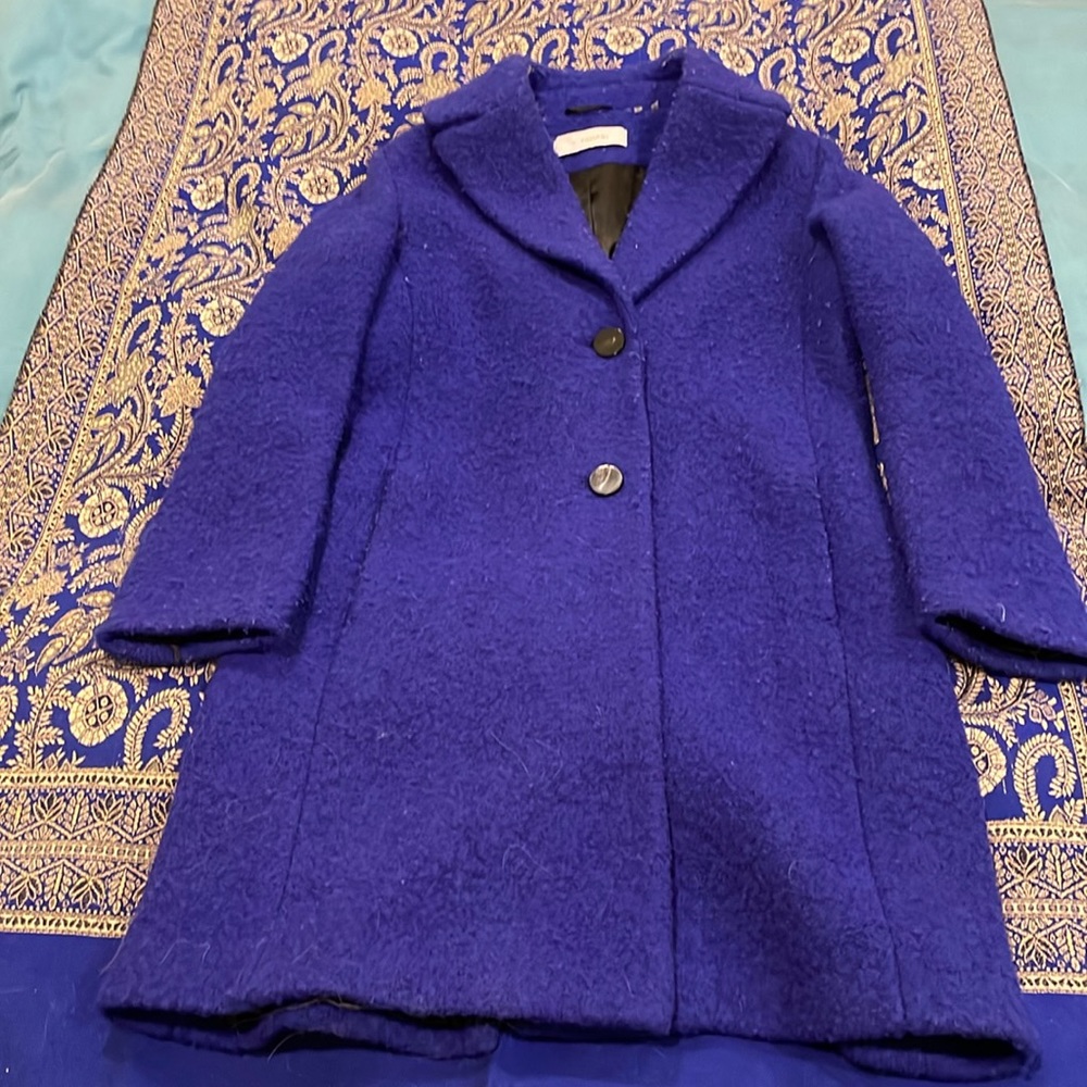 A like-new wool Elie Tahari 2/3 length coat.